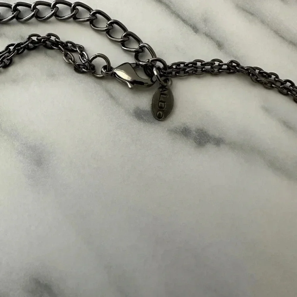 Aldo fashion necklace silver black and red stones @18” long